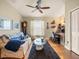 Versatile office area with hardwood floors, ceiling fan, and desk workstation at 4292 Tahiti Dr, Hernando Beach, FL 34607
