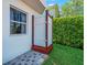 Outdoor shower with privacy enclosure, surrounded by lush greenery at 4292 Tahiti Dr, Hernando Beach, FL 34607