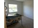 Bedroom with neutral carpeting and a window providing natural light at 441 75Th N Ave # 441, St Petersburg, FL 33702