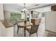 Bright, open living space with a view of the kitchen and living room, perfect for entertaining at 4424 Whitetail Ln, New Port Richey, FL 34653