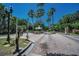 Gorgeous community entrance with gate and meticulously manicured landscaping at 4485 Gevalia Dr, Brooksville, FL 34604