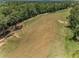 Scenic aerial of the golf course features lush green fairways and mature trees at 4485 Gevalia Dr, Brooksville, FL 34604