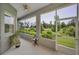 Serene screened lanai offering peaceful views of the golf course at 4485 Gevalia Dr, Brooksville, FL 34604