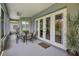 Inviting screened lanai with golf course views and comfortable seating area at 4485 Gevalia Dr, Brooksville, FL 34604