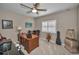 Office with an executive desk, ceiling fan, neutral walls, and a view from the window at 4485 Gevalia Dr, Brooksville, FL 34604