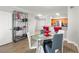 Chic living and dining area with modern décor, perfect for entertaining guests, and ample natural light at 4516 Seagull Dr # 512, New Port Richey, FL 34652