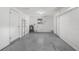 Finished basement area with concrete floor, water heater and storage at 4520 Blanche St, New Port Richey, FL 34652