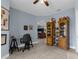 Functional office space with built-in shelving and desk, providing a dedicated area for work or hobbies at 4960 Hidden Knob Trl, Spring Hill, FL 34609