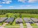 Aerial view featuring homes adjacent to the scenic conservation area at 5005 Southern Valley Loop, Brooksville, FL 34601