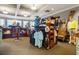 Golf pro shop displaying golf apparel, equipment, and accessories in a well-lit and organized space at 5005 Southern Valley Loop, Brooksville, FL 34601