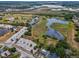 Aerial view of the property showcasing the land and neighborhood at 5132 Flora Ave, Holiday, FL 34690