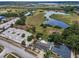 Amazing aerial view showing the proximity to the river and green space, also showcasing a private screened-in pool at 5132 Flora Ave, Holiday, FL 34690