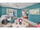 Cozy living room with a view of the outdoor patio and pool area at 5132 Flora Ave, Holiday, FL 34690