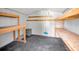 Shed interior contains shelving and storage space for your lawn and garden supplies at 5132 Flora Ave, Holiday, FL 34690