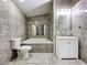 Stylish bathroom with vanity, toilet, and separate tub at 6158 Sumter Dr, Brooksville, FL 34602