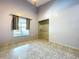 Bedroom overlooking the pool with tile flooring, a closet, and a ceiling fan at 6158 Sumter Dr, Brooksville, FL 34602