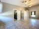 Spacious bedroom with a tile floor and includes a closet with lots of storage space at 6158 Sumter Dr, Brooksville, FL 34602