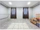 Walk-in closet featuring storage, with tiled floor, and natural light at 6158 Sumter Dr, Brooksville, FL 34602