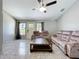 Comfortable living room with plush seating, a rustic coffee table, and ample natural light at 6158 Sumter Dr, Brooksville, FL 34602