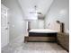 Spacious main bedroom with neutral walls, tile floors, and ample closet space at 6158 Sumter Dr, Brooksville, FL 34602