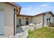 Inviting front porch featuring a covered entrance and a charming accent wall at 6231 Westport Dr, Port Richey, FL 34668