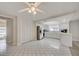 Eat-in kitchen features white cabinetry, modern appliances, and tiled floors at 6231 Westport Dr, Port Richey, FL 34668