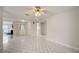 Bright living room featuring tiled floors, a ceiling fan and an open concept at 6231 Westport Dr, Port Richey, FL 34668