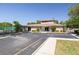 Clubhouse exterior featuring accessible parking, well-maintained landscaping, and a welcoming entrance at 6508 Tina Dr # 14, New Port Richey, FL 34653