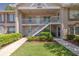 Charming two-story condo with well-maintained landscaping and inviting walkways at 6508 Tina Dr # 14, New Port Richey, FL 34653