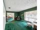 Comfortable living room featuring classic furnishings, ample seating, and views to the dining area at 6823 Oak Hill Dr, New Port Richey, FL 34653