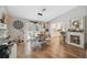 Open dining area with a view of the living room and natural light at 7340 20Th, Zephyrhills, FL 33540
