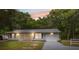 Charming single story home with lush lawn, attached garage, and neutral exterior at 7340 20Th, Zephyrhills, FL 33540