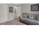 Bedroom featuring a floral couch at 7736 Chadwick Dr, New Port Richey, FL 34654