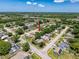 Beautiful neighborhood aerial highlighting the property's location, trees, and street access at 7979 Avenal Loop, New Port Richey, FL 34655