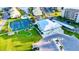Community amenities including a clubhouse, tennis courts, pool, and parking area are all meticulously maintained at 8211 Brent St # 836, Port Richey, FL 34668