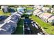 Aerial view showcasing a waterfront community with private boat docks, lush landscaping, and serene waterways at 8211 Brent St # 836, Port Richey, FL 34668