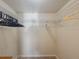 Walk-in closet featuring built in shelves and storage racks for organizing clothes and other belongings at 8211 Brent St # 836, Port Richey, FL 34668