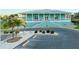 Stylish clubhouse with ample parking and landscaped grounds provides a welcoming community gathering space at 8211 Brent St # 836, Port Richey, FL 34668