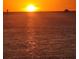 Brilliant sunset over tranquil waters nearby at 8211 Brent St # 836, Port Richey, FL 34668