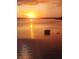 Stunning sunset reflecting on the water near the property at 8211 Brent St # 836, Port Richey, FL 34668
