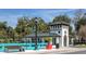Scenic view of the New Port Richey welcome center with trees, bridge and landscaping at 8409 Blue Rock Dr, New Port Richey, FL 34653