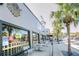 Charming sidewalk cafe with outdoor seating and large windows for a casual dining experience at 8409 Blue Rock Dr, New Port Richey, FL 34653