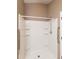 Bathroom shower with built-in shelves and grab bars at 8409 Blue Rock Dr, New Port Richey, FL 34653