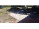 Outdoor paver patio with table and chairs for outdoor relaxation and entertaining at 8711 Jolly Roger Dr, Hudson, FL 34667
