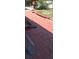 Brick-paved walkway adds charm with garden features and landscaping details at 8711 Jolly Roger Dr, Hudson, FL 34667