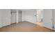 Bright bedroom with tile flooring and a closet is ideal for storage at 8807 Village Mill Row, Hudson, FL 34667