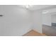 Hallway with brick accent wall and decorative lighting fixtures at 8807 Village Mill Row, Hudson, FL 34667