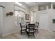 Cozy breakfast nook features a round table, seating for four, and natural light at 9019 Flagstick Ln, Hudson, FL 34667