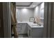 Bright bathroom featuring modern fixtures and a neutral color palette, creating a relaxing atmosphere at 9116 Gray Fox Ln, Port Richey, FL 34668