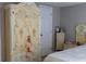 Bedroom wardrobe with intricate detailing and decorative floral accents at 9116 Gray Fox Ln, Port Richey, FL 34668